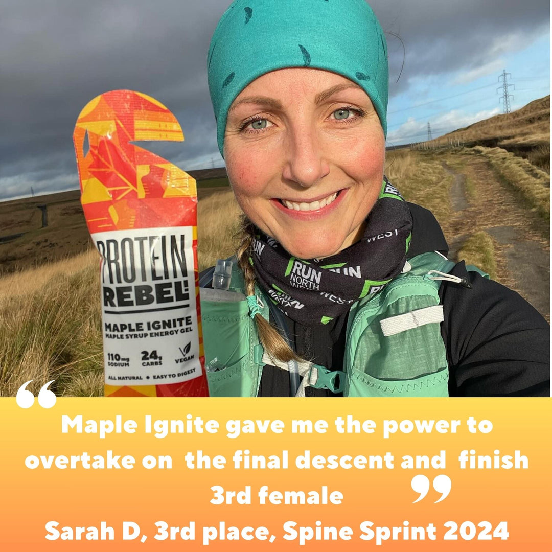 Female runner in the hills holding Maple Ignite energy gel with a quote crediting her running performance to these gels